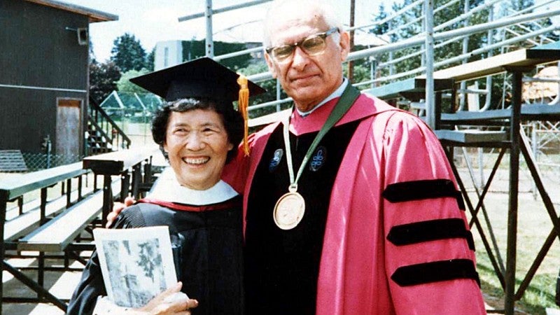 Michi Yasui Ando and UO President Paul Olum at the UO's 1986 commencement