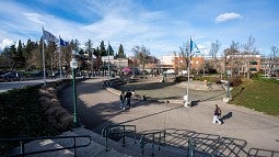 An amphitheater with people walking outside the bowl